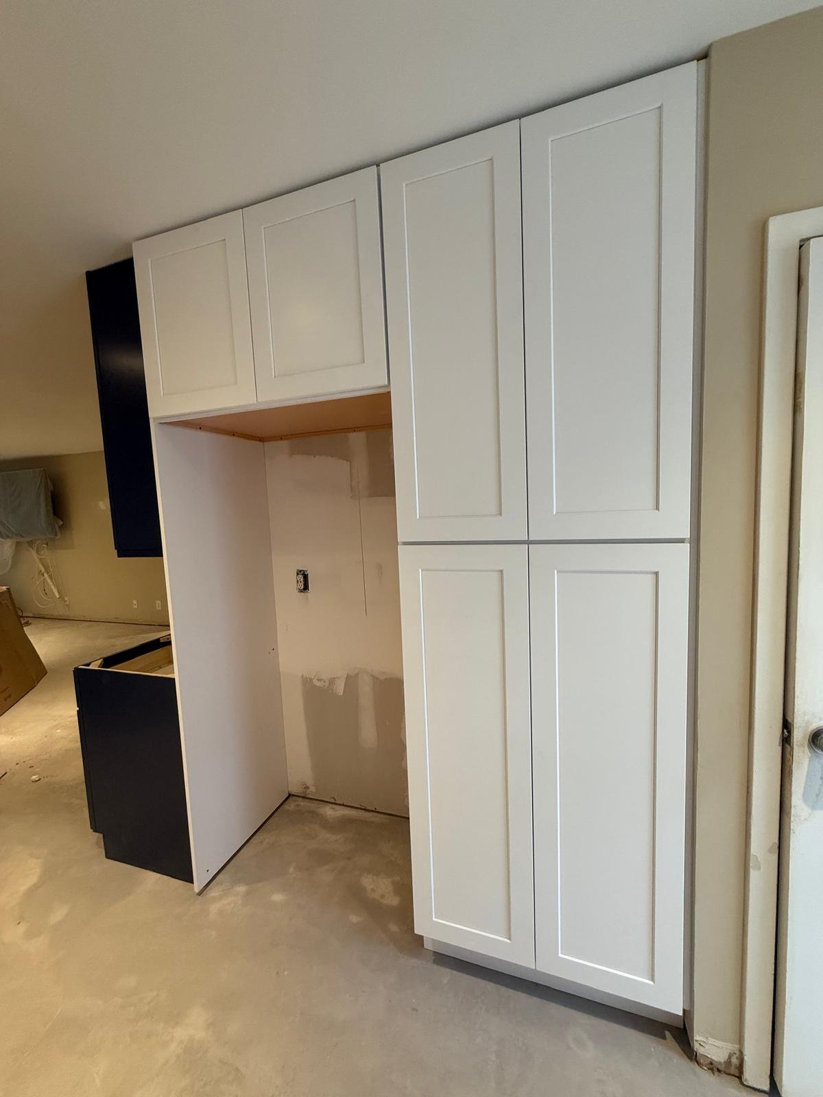 Installed kitchen cabinets and counter run